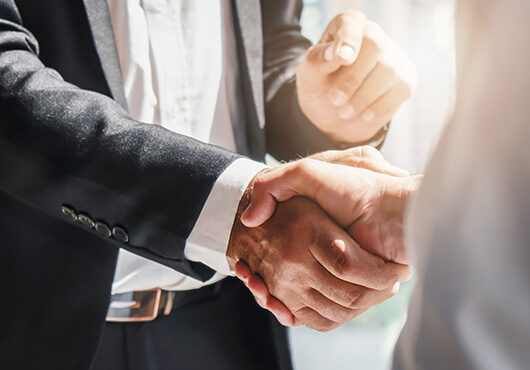 Business background of businessman having handshake